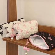 Bow-Print Polyester Mini Cosmetic Pouch — 14 × 10 cm