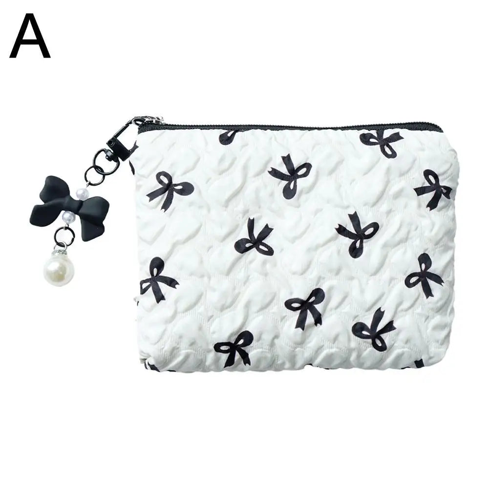 Bow-Print Polyester Mini Cosmetic Pouch — 14 × 10 cm