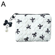 Bow-Print Polyester Mini Cosmetic Pouch — 14 × 10 cm