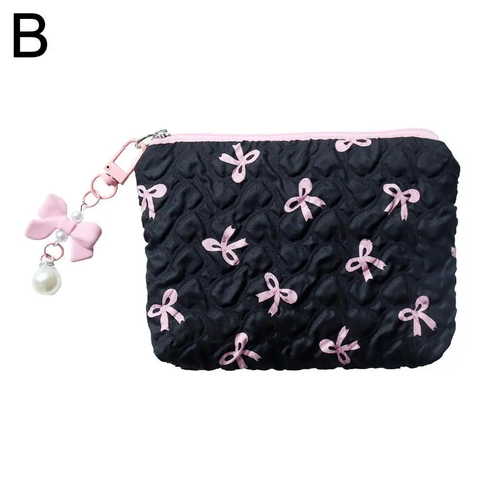 Bow-Print Polyester Mini Cosmetic Pouch — 14 × 10 cm