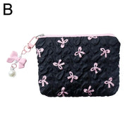 Bow-Print Polyester Mini Cosmetic Pouch — 14 × 10 cm
