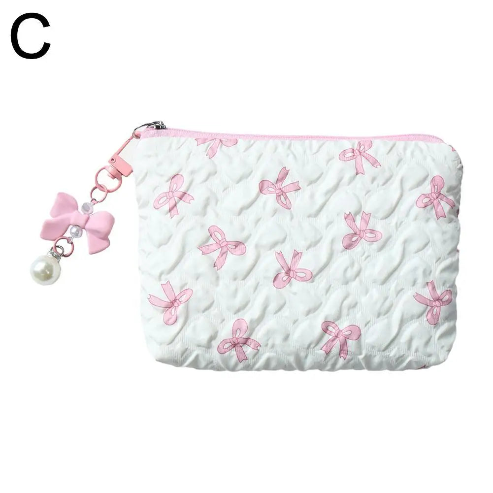 Bow-Print Polyester Mini Cosmetic Pouch — 14 × 10 cm