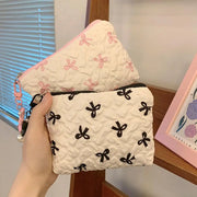Bow-Print Polyester Mini Cosmetic Pouch — 14 × 10 cm