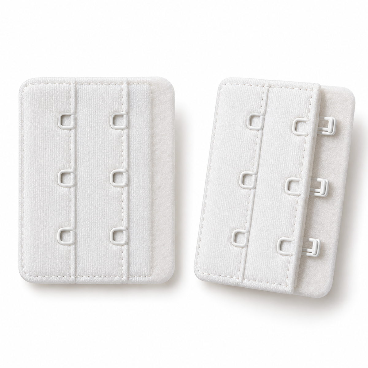 Dritz white bra extenders on a white studio background