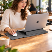 PU Laptop Sleeve with Folding Stand — 13–16 Inch Options — shown in use; styling props not included