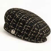 Textured Check Newsboy Cap with Decorative Button — studio product view