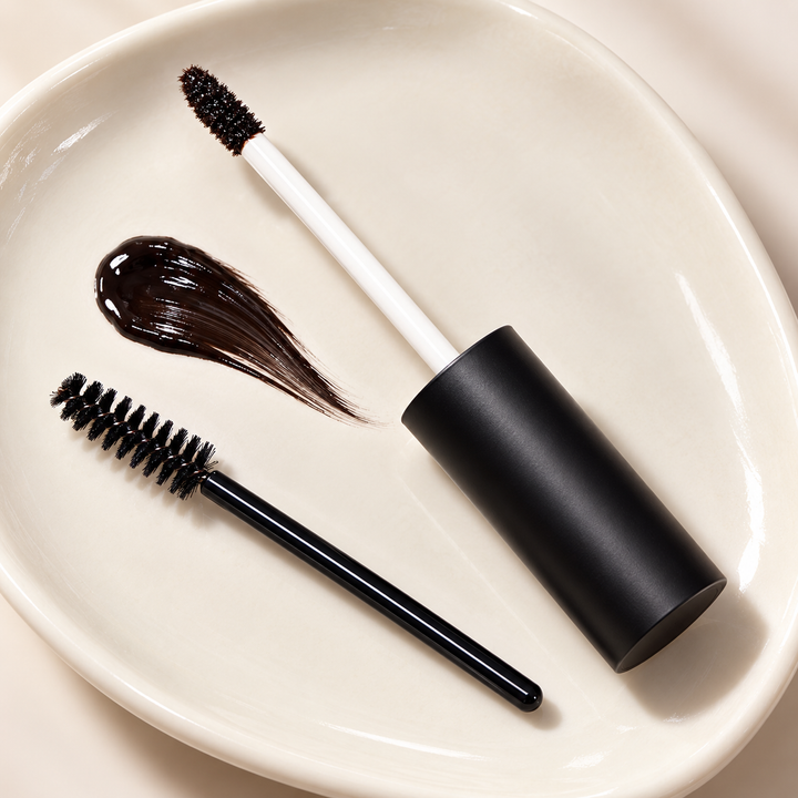Peel-off brow tint applicator and spoolie detail with gel swatch
