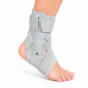 Grey ankle support with adjustable straps