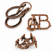 3-Piece Bronze-Tone Metal Puzzle Set — detail