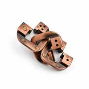 Bronze-tone interlocking metal puzzle, angled detail