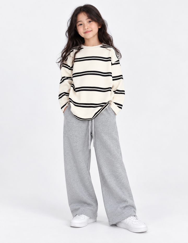 Girls' striped top and gray wide-leg pants, front view