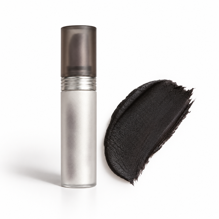 Matte lip color tube with black shade swatch on white background