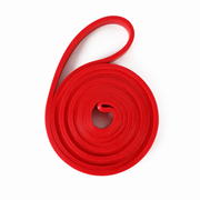 One red resistance loop band — product only