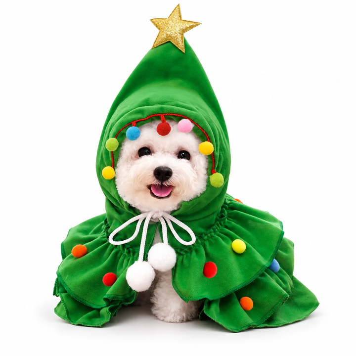 Green Christmas tree pet costume on a small white dog