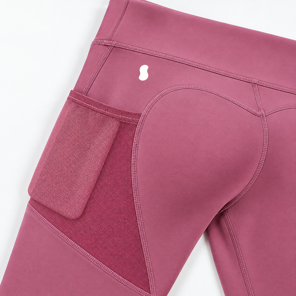 rose pink mesh-pocket activewear leggings — construction detail