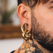 gold saddle ear tunnels worn