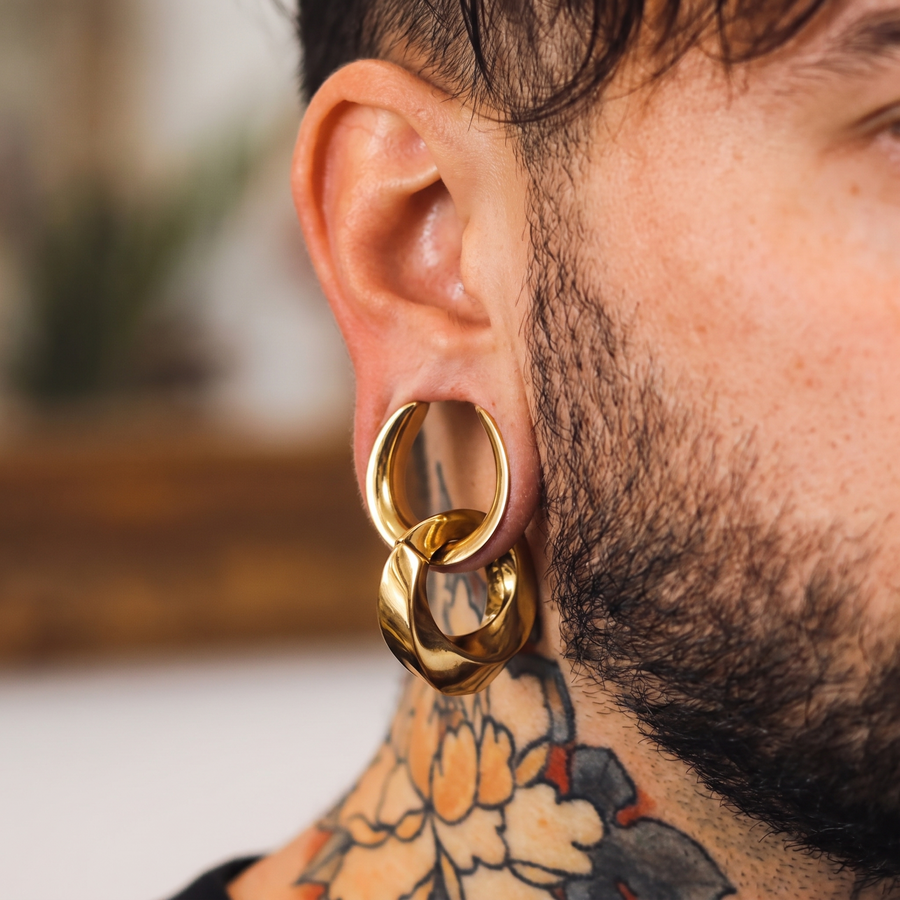 Stainless Steel Saddle Ear Tunnel Plugs – lifestyle view
