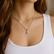 stainless steel initial A necklace worn