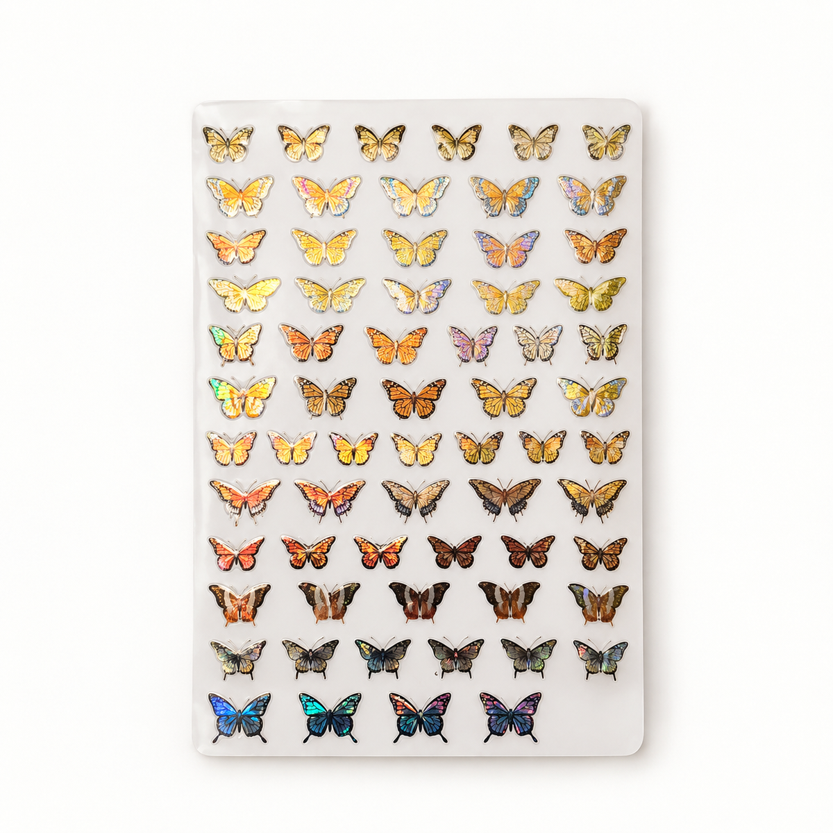 Assorted holographic butterfly nail stickers on a white studio background