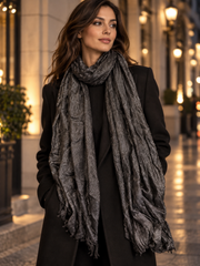 Marcus Adler black metallic shimmer scarf styled with a black coat