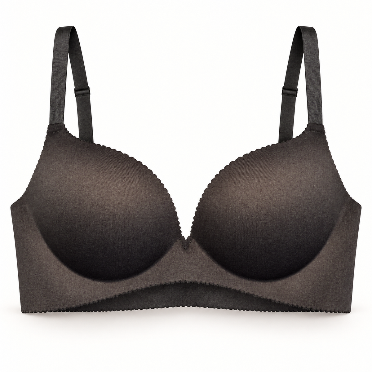 Streamline black nude smoothing wireless bra on a warm-white studio background
