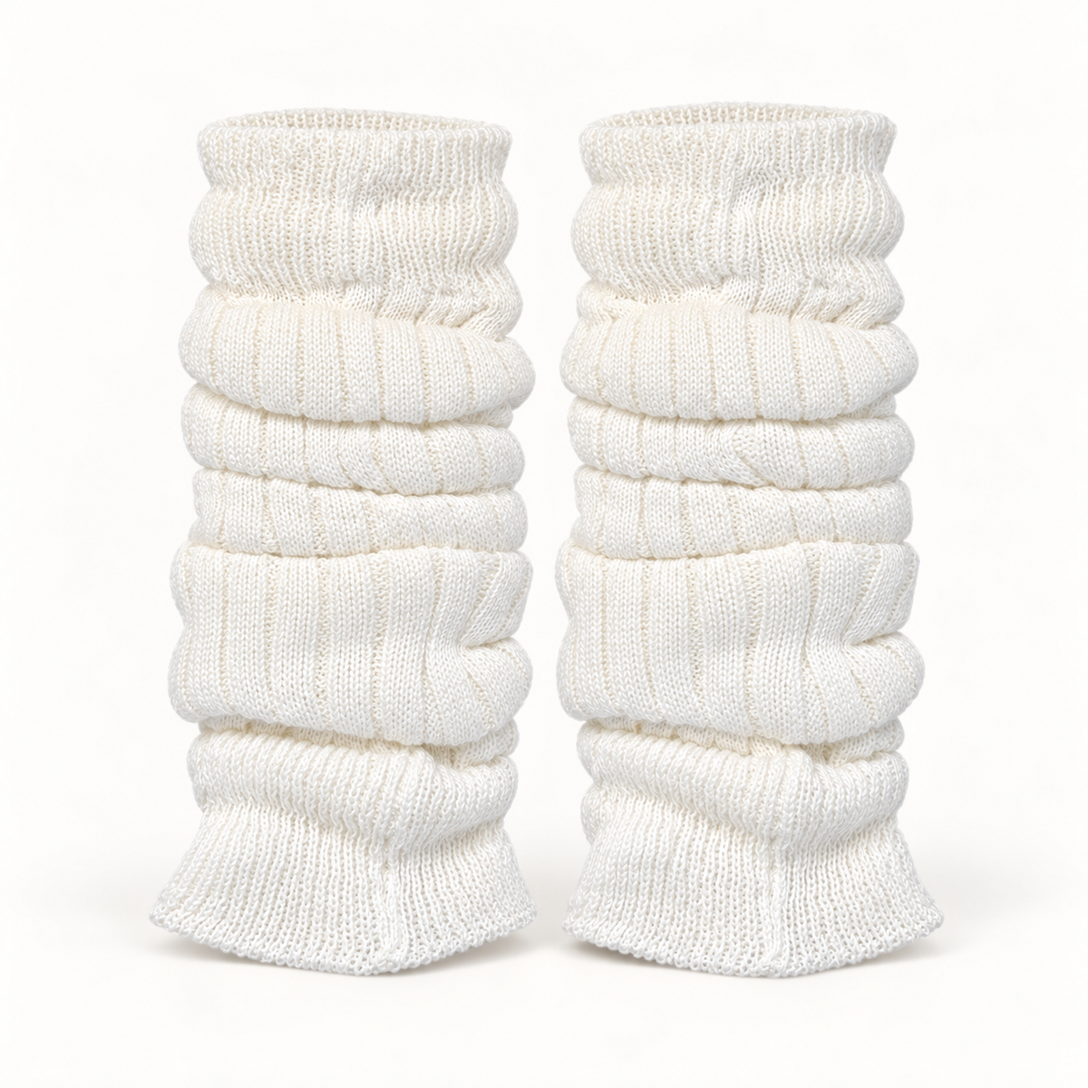 Via Rosa white ribbed leg warmers on a warm-white studio background